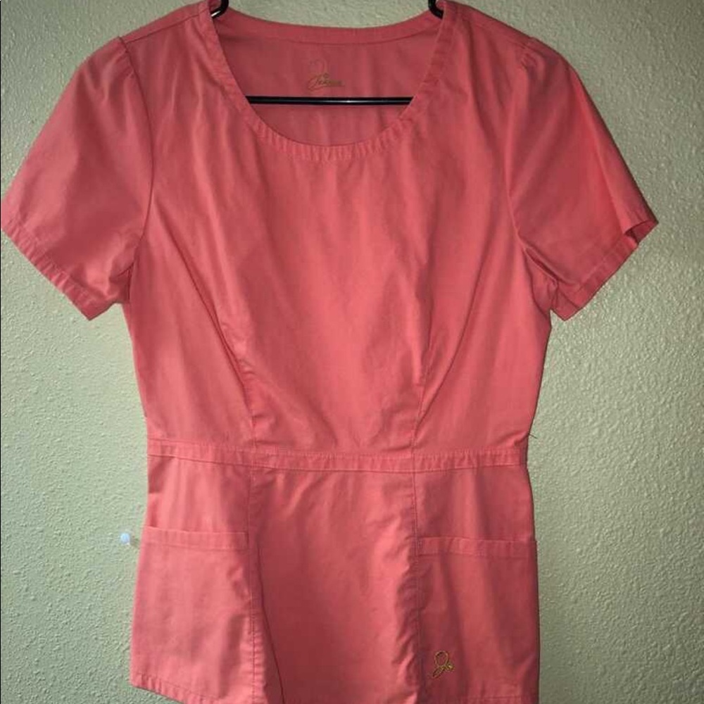 Jaanuu Peplum Scrub Top in Coral